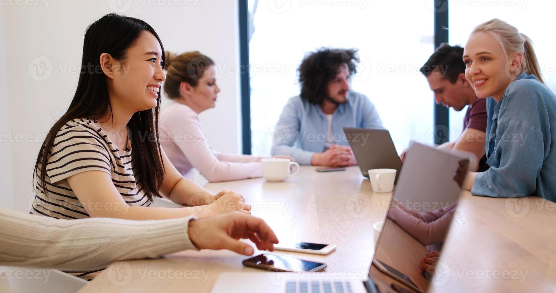 Startup Business Team At A Meeting at modern office building photo