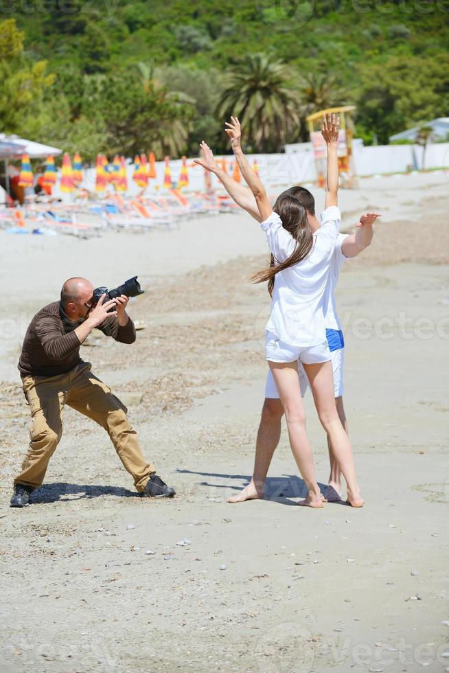 photographer taking photo on beach