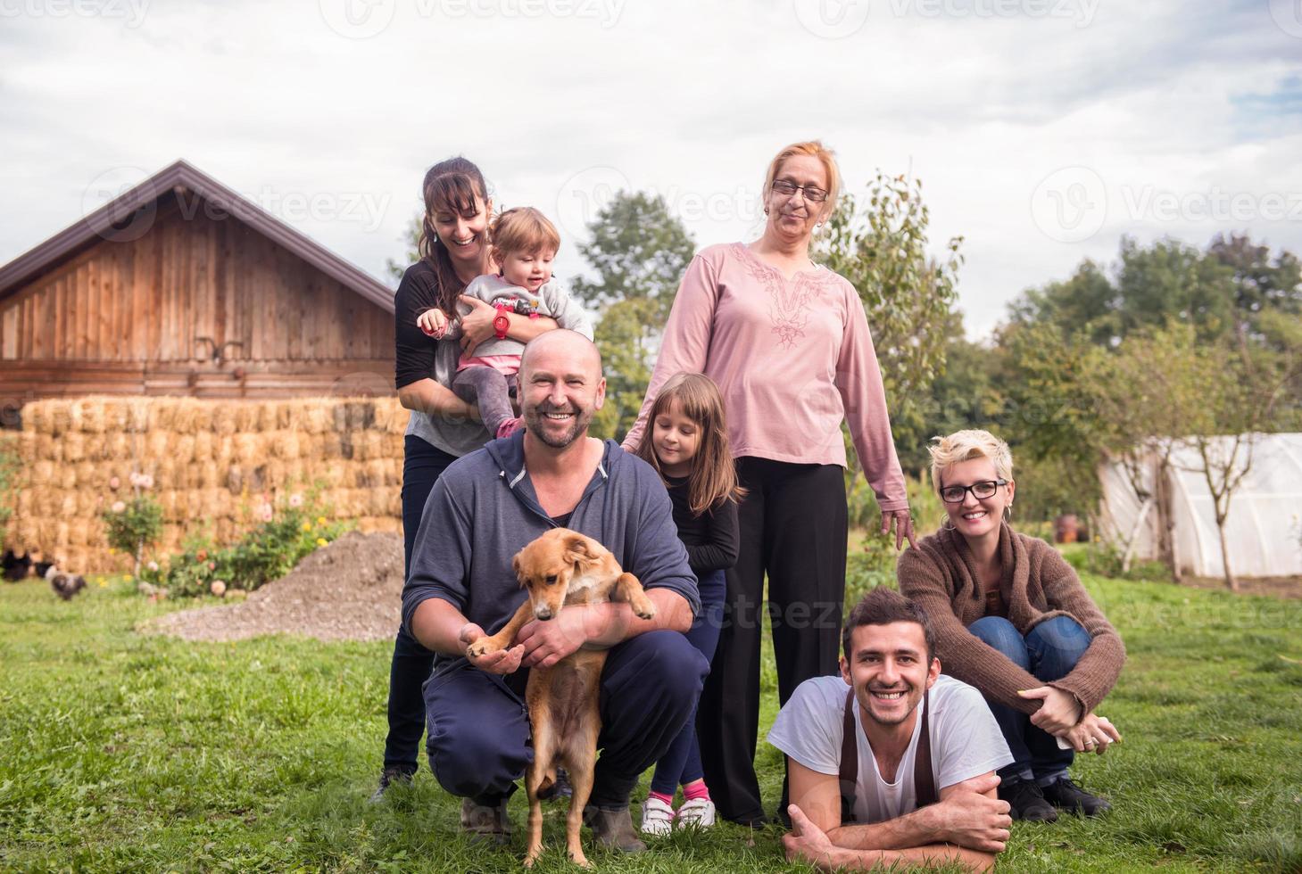 portrait of happy family at farm photo