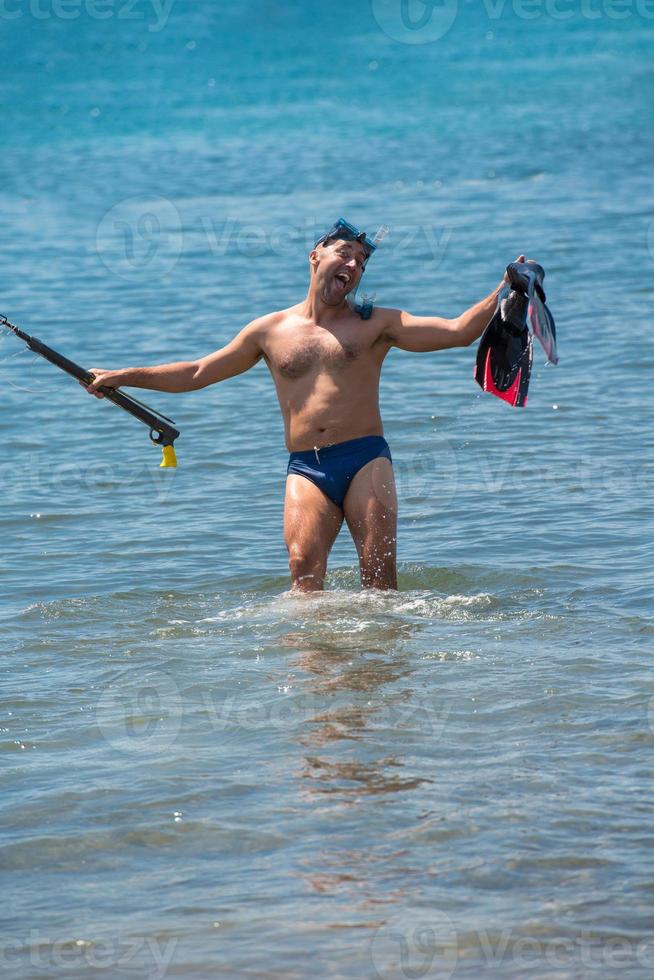 fisherman preparing for underwater fishing photo