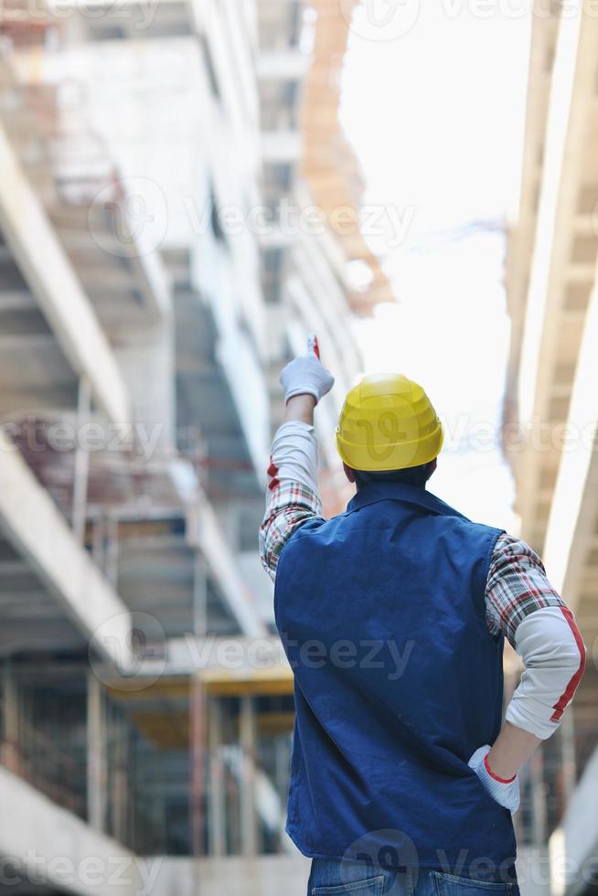 hard worker on construction site photo