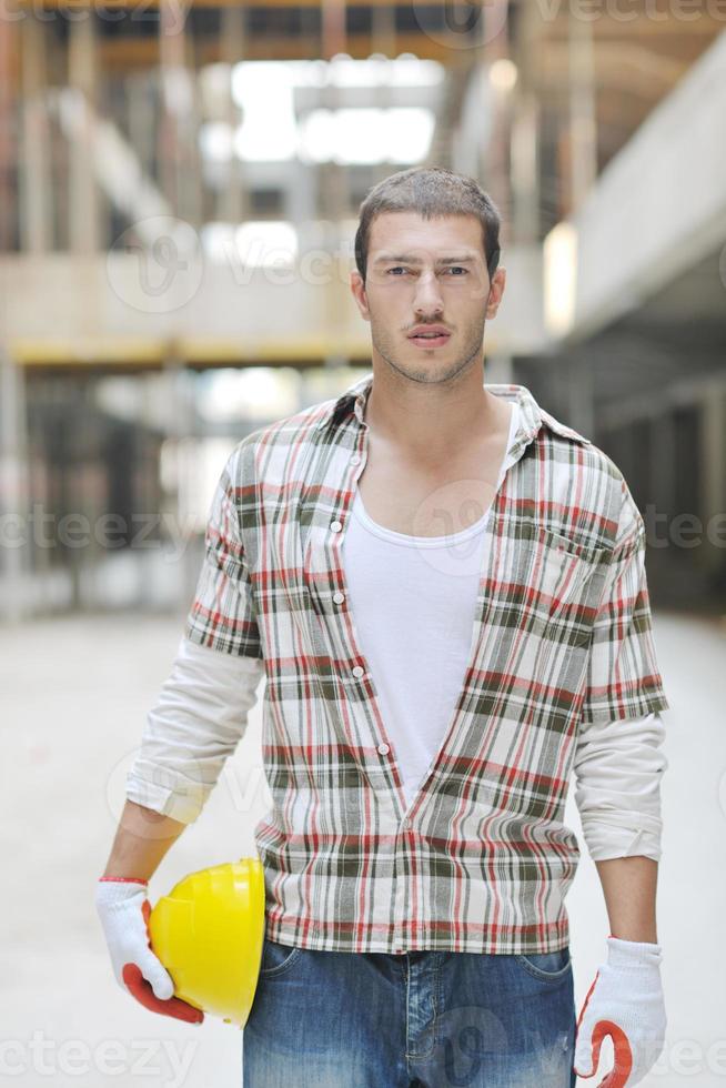 hard worker on construction site photo