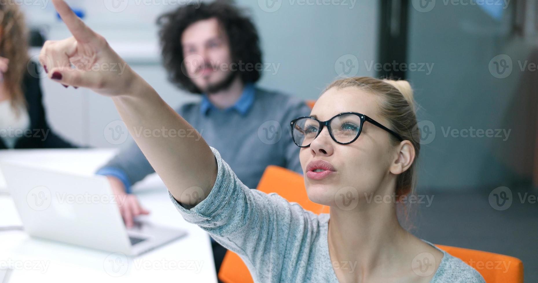 Startup Business Team At A Meeting at modern office building photo