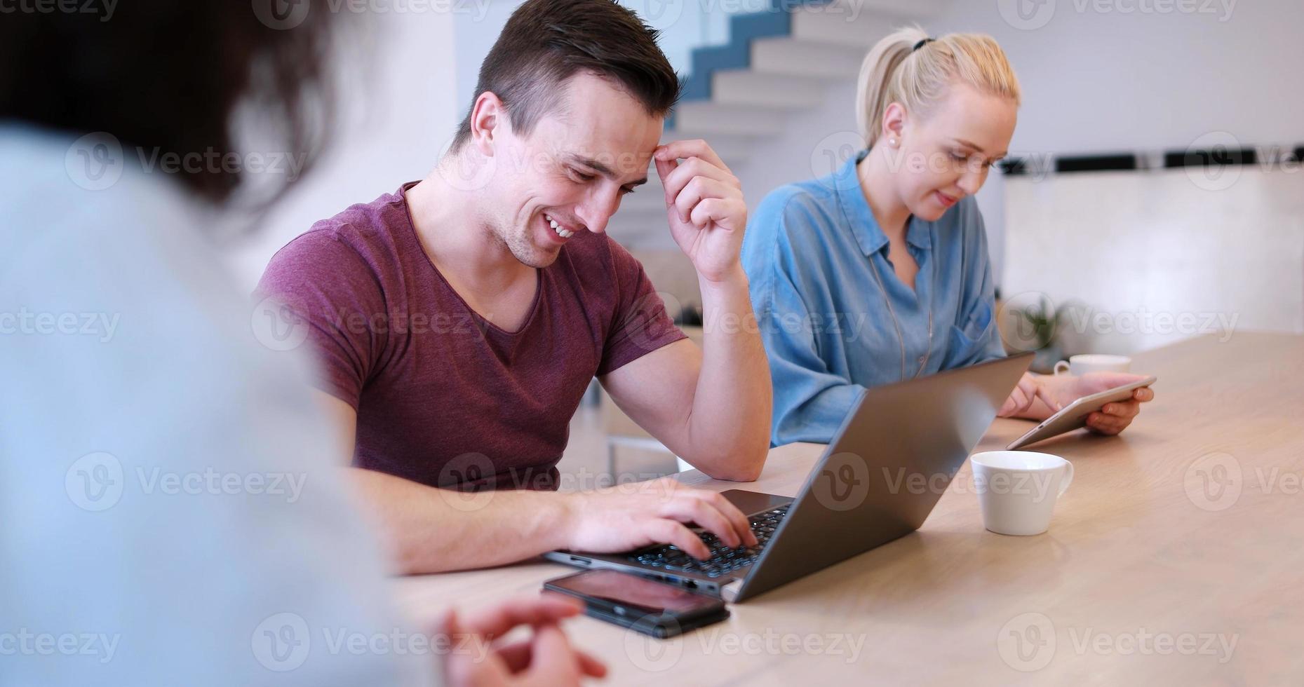 Startup Business Team At A Meeting at modern office building photo