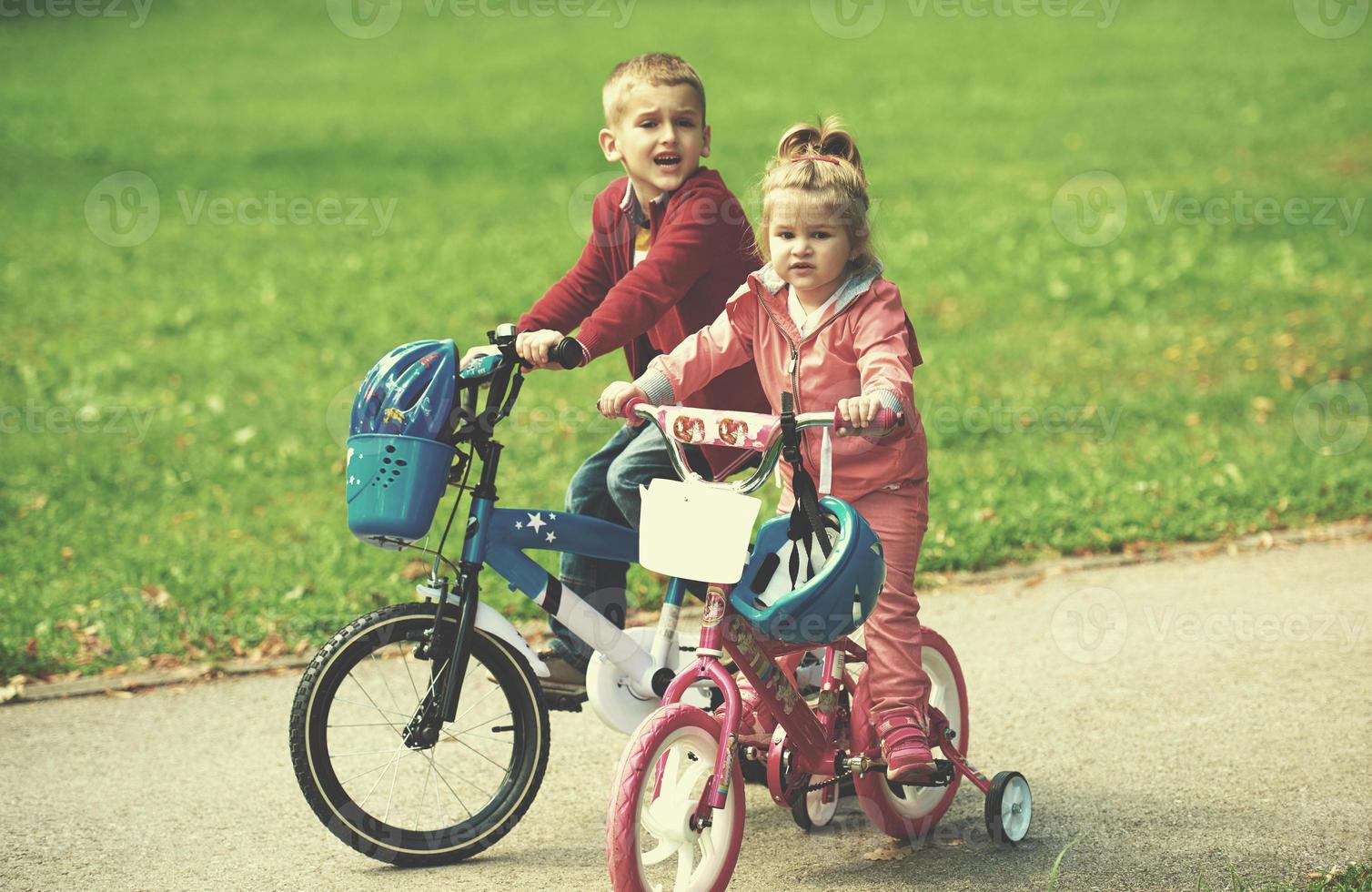 boy and girl with bicycle photo