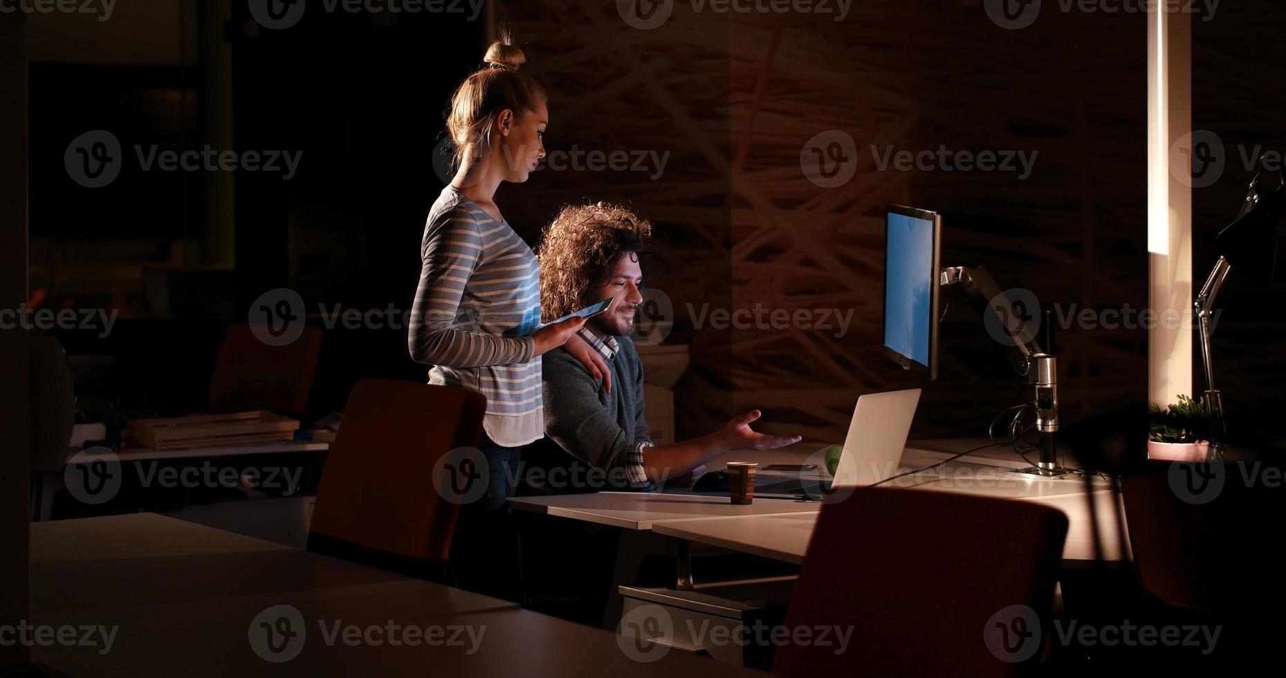 young designers in the night office photo