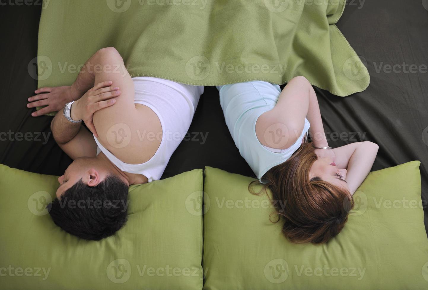 young couple in bed photo