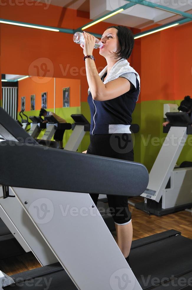 Young woman drinking water while working out 11282092 Stock Photo at