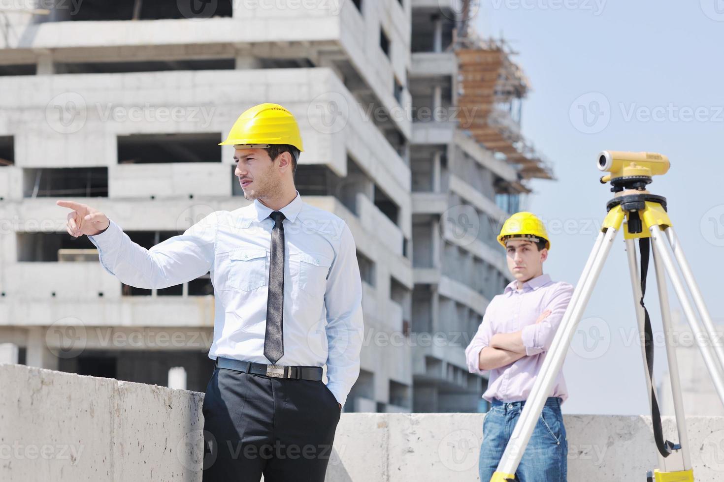 Team of architects on construciton site photo