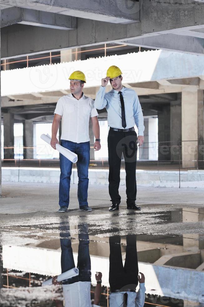 Team of architects on construciton site photo
