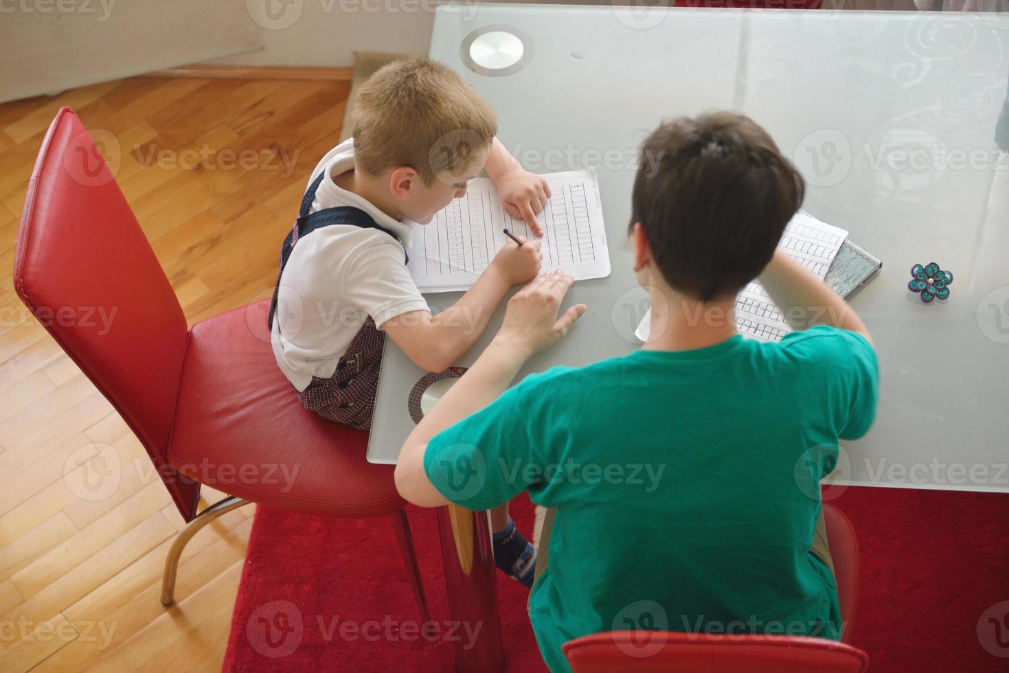 Boy doing homework photo