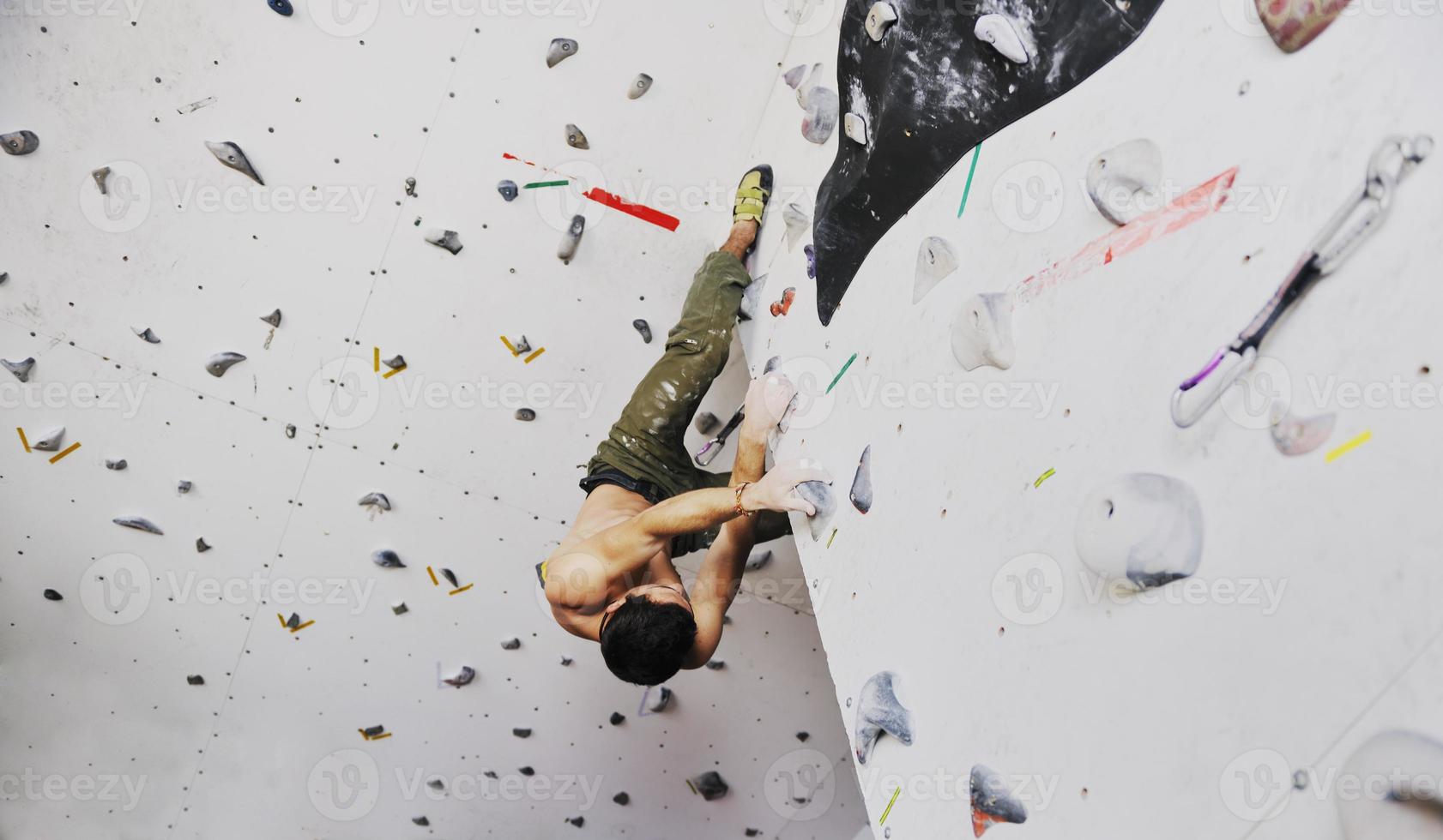 Man rock climbing photo