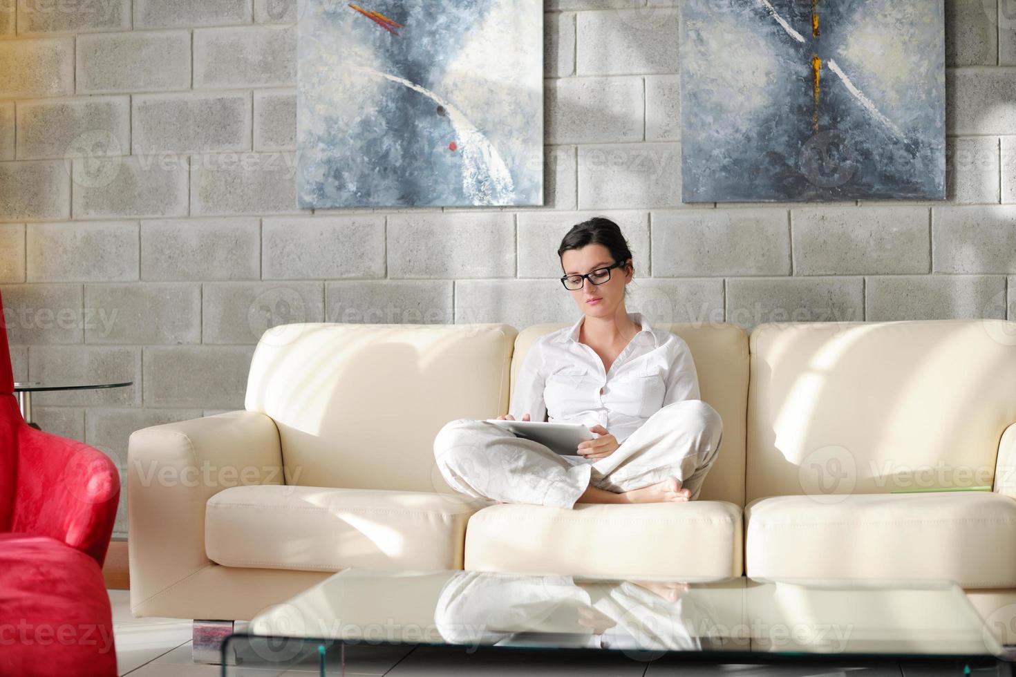 woman using tablet pc at home photo