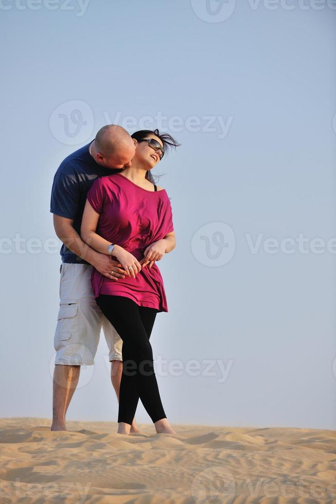 couple enjoying the sunset photo