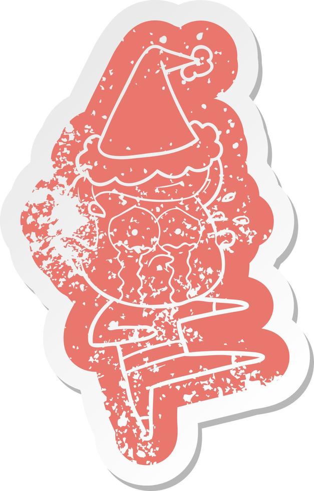 cartoon distressed sticker of a crying dancer wearing santa hat vector