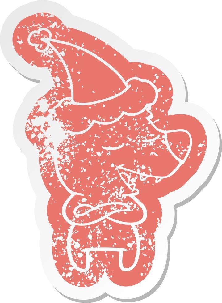 cartoon distressed sticker of a bear wearing santa hat vector