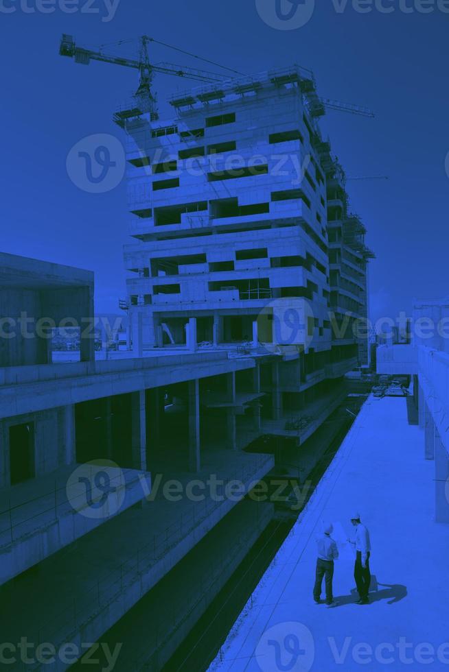 Team of architects on construciton site photo