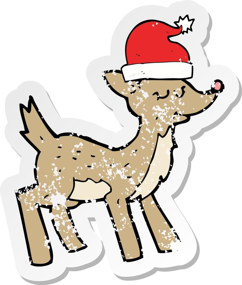 retro distressed sticker of a cartoon cute christmas reindeer vector