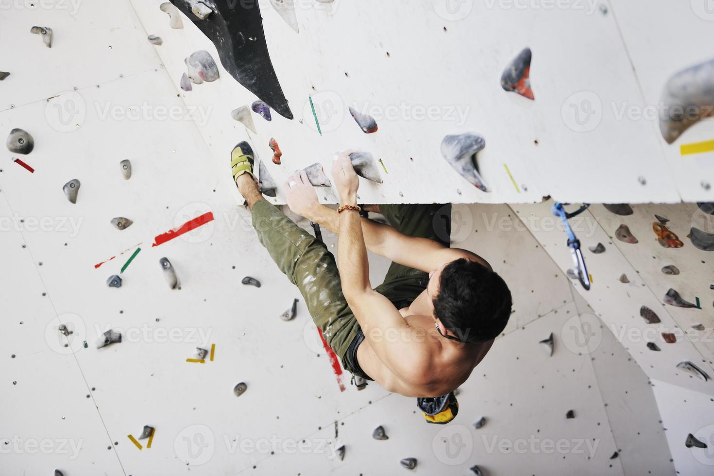 Man rock climbing photo