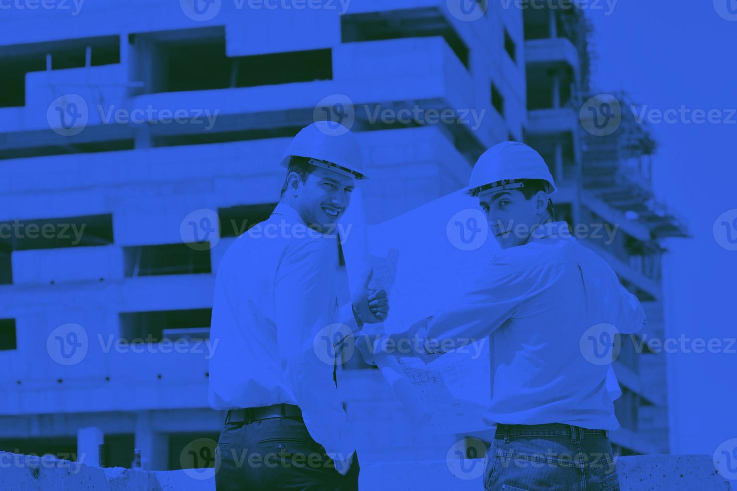 Team of architects on construciton site photo