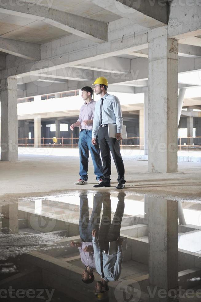 Team of architects on construciton site photo