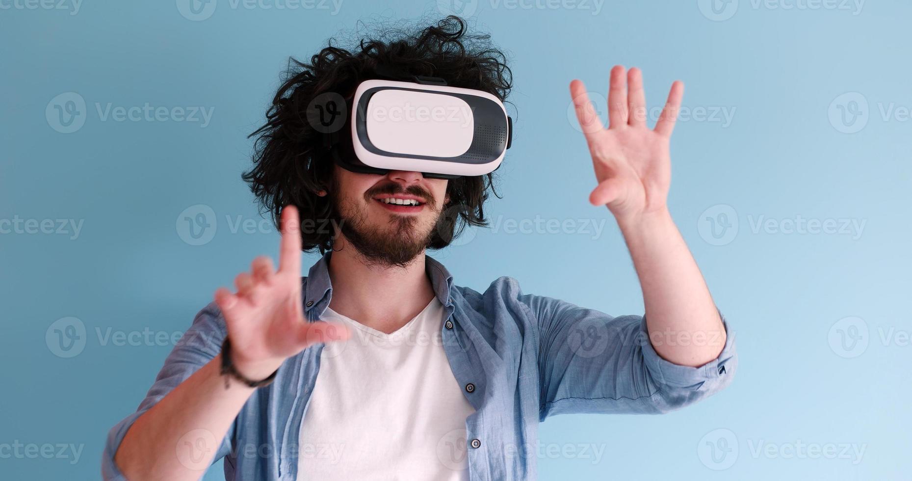 man using VR headset glasses of virtual reality photo