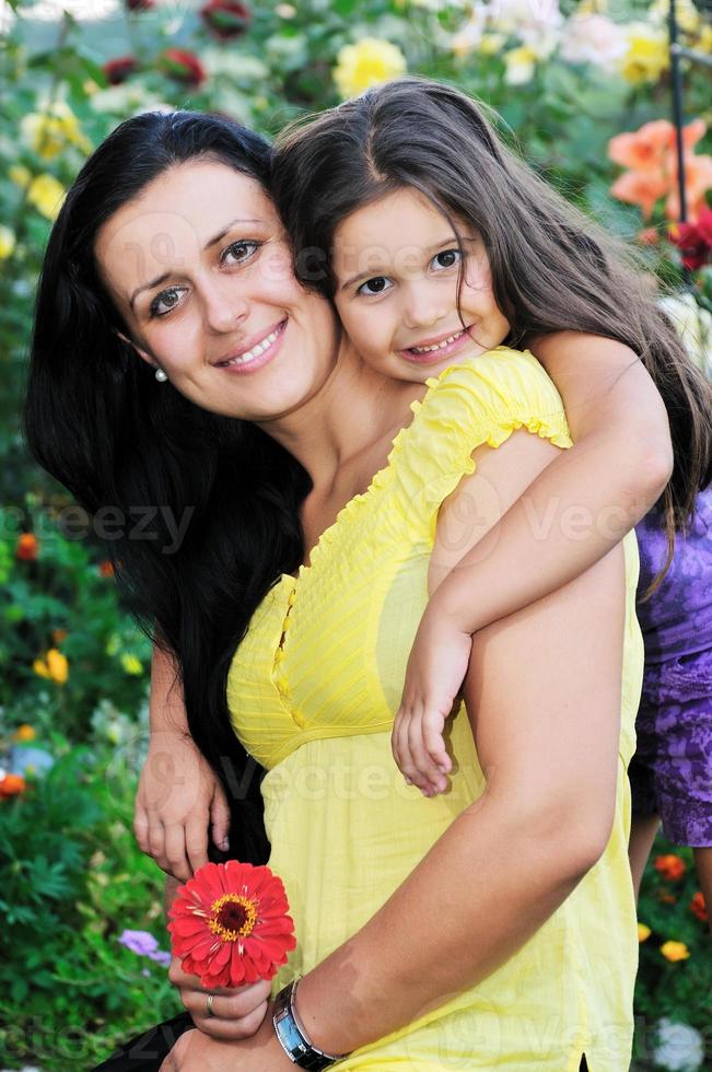 happy mom and daughter outdoor photo