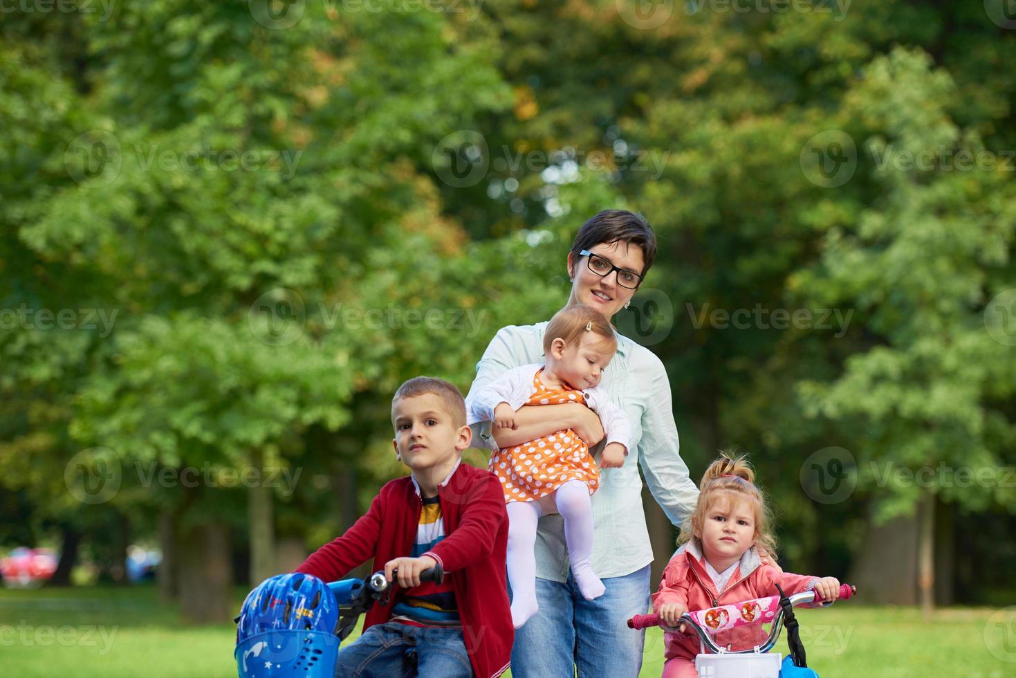 happy young family in park photo