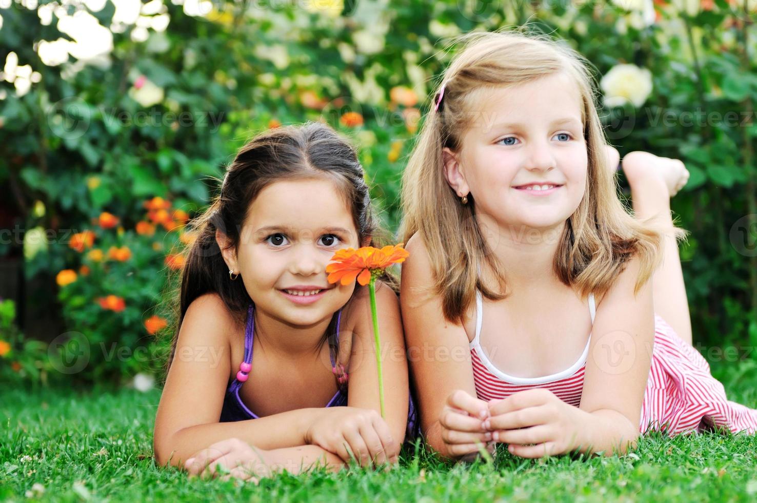 two happy girls have fun outdoor photo