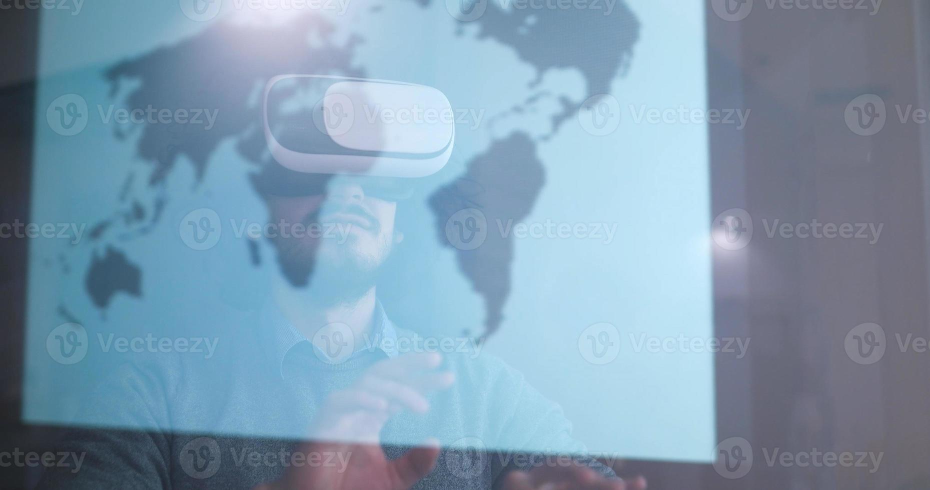 man using VR-headset glasses of virtual reality photo