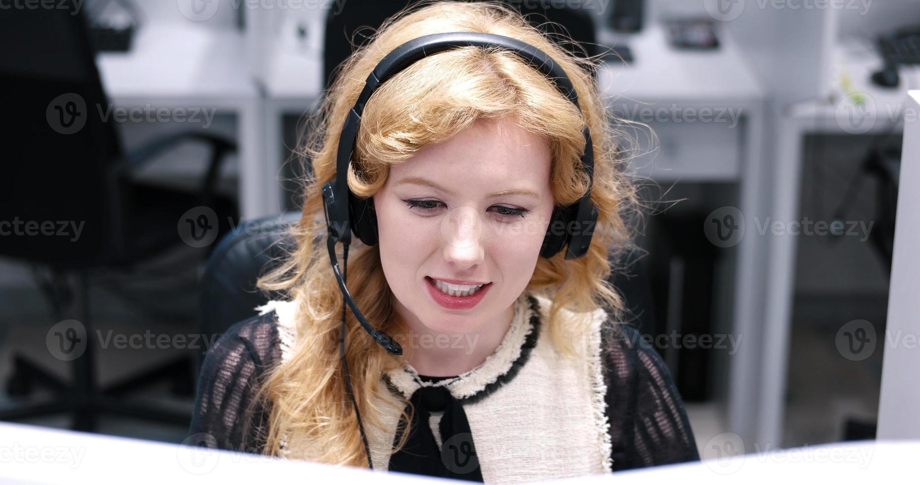 female call centre operator doing her job photo