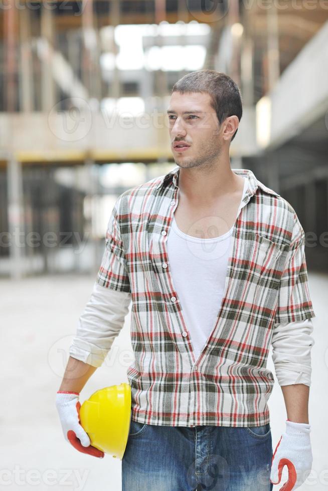 hard worker on construction site photo