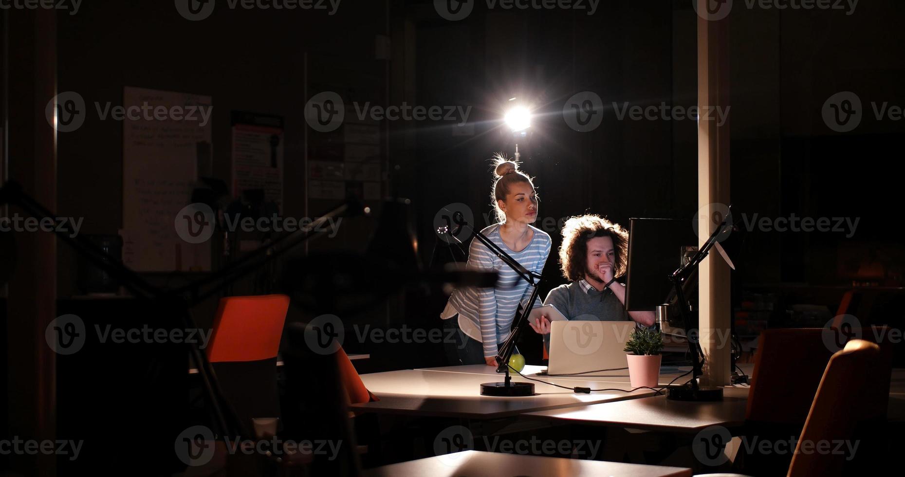 young designers in the night office photo