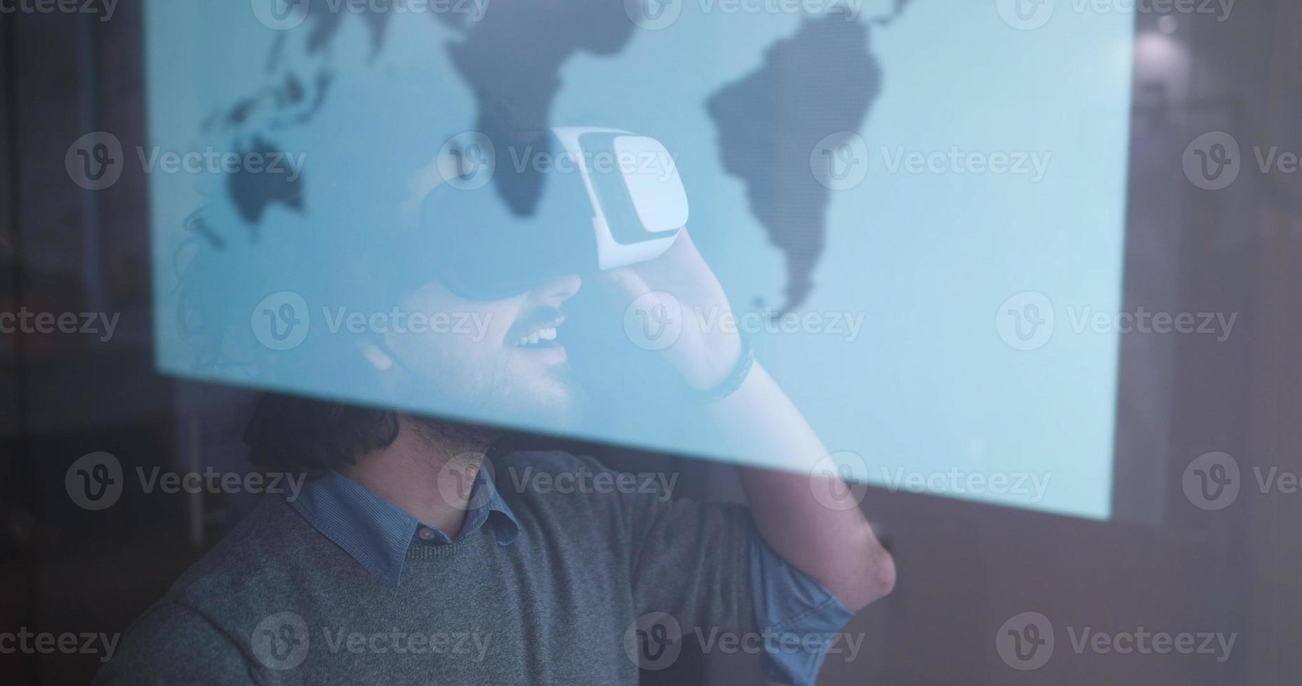 man using VR-headset glasses of virtual reality photo