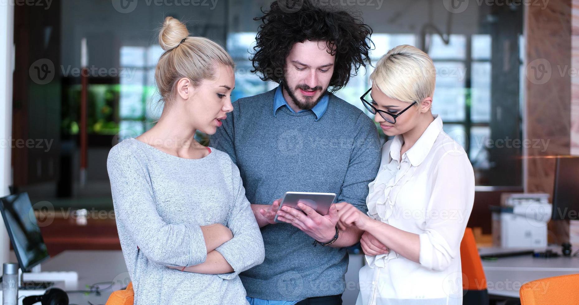 Startup Business Team At A Meeting at modern office building photo