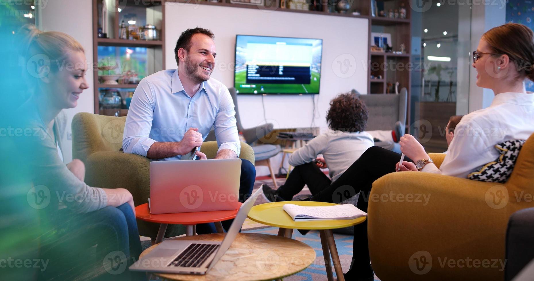 Startup Business Team At A Meeting at modern office building photo