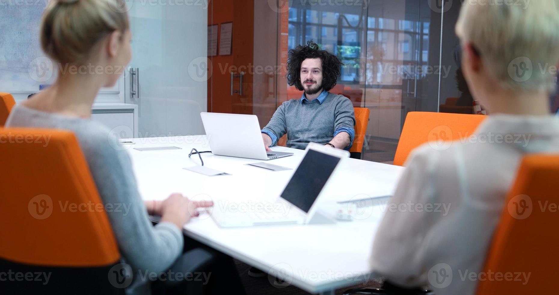 Startup Business Team At A Meeting at modern office building photo