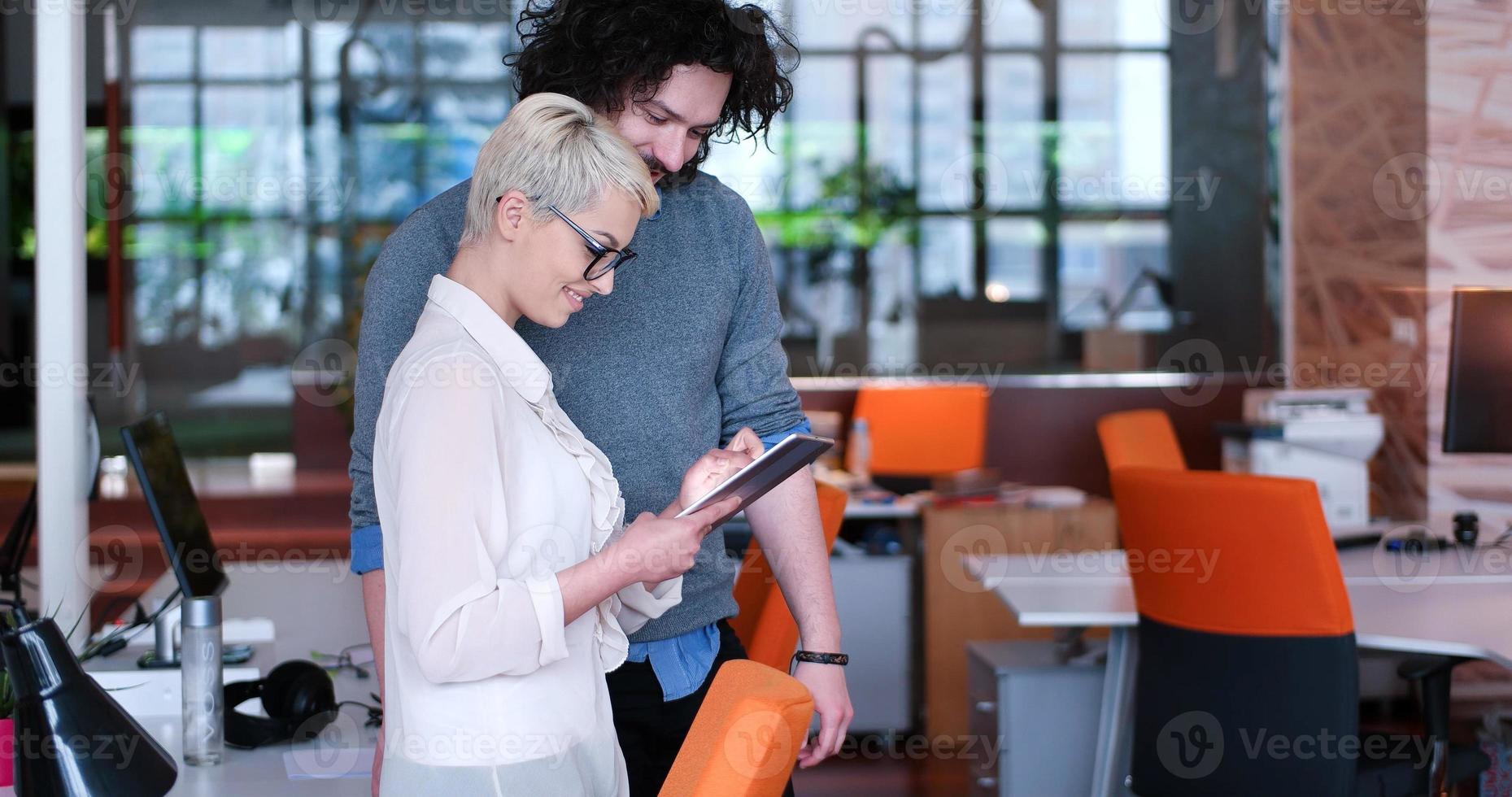 Business People Working With Tablet in office photo