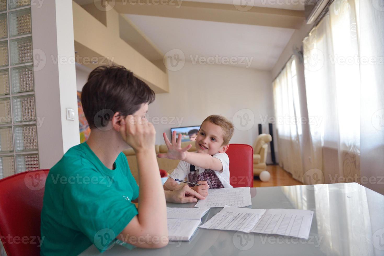 Boy doing homework photo