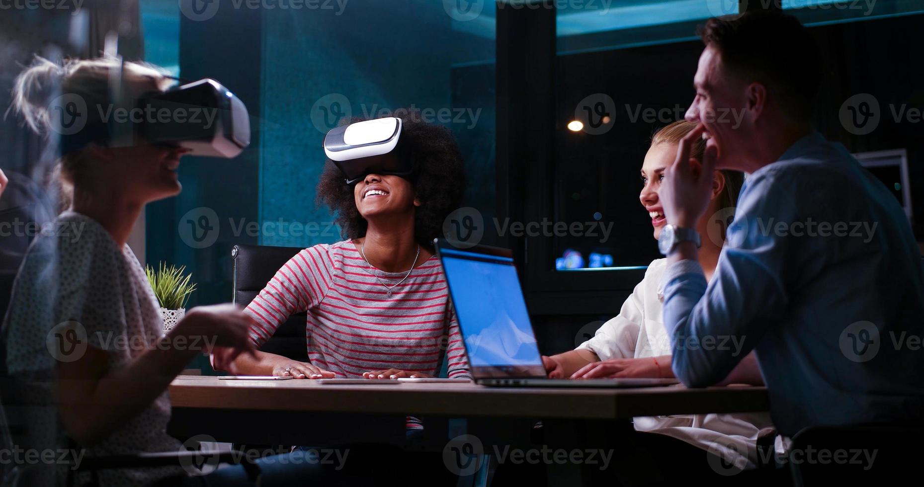 Multiethnic Business team using virtual reality headset photo