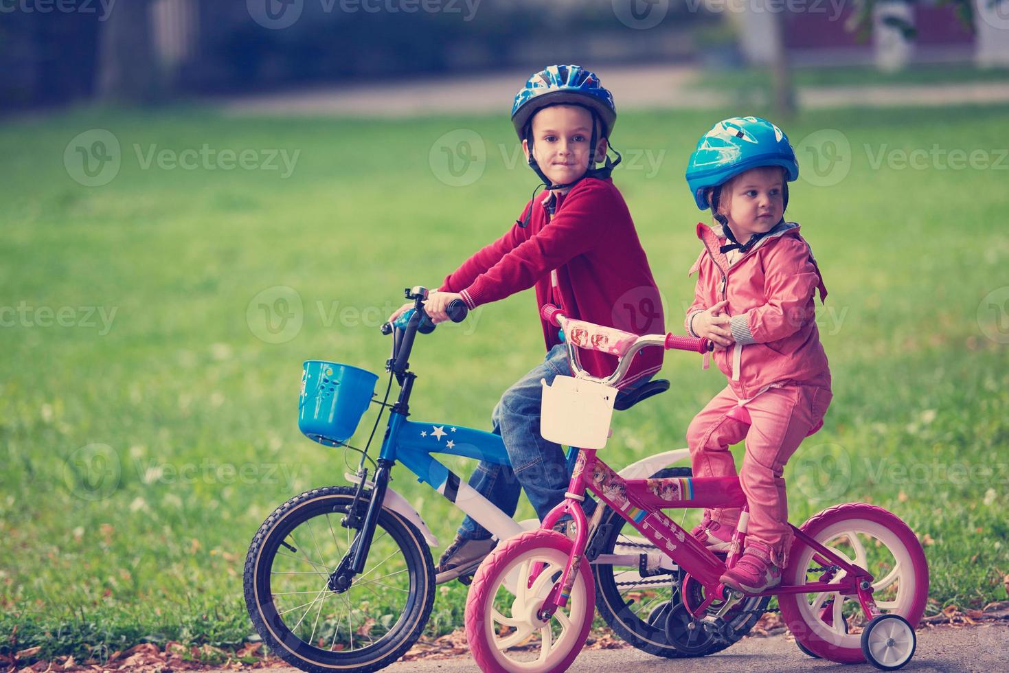 boy and girl with bicycle photo