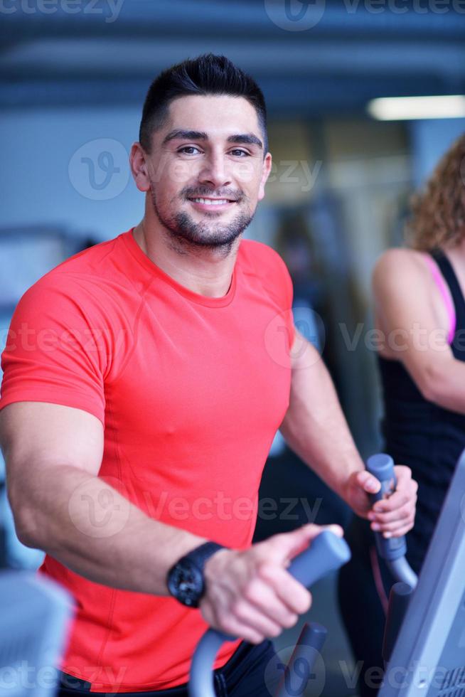 man running on the treadmill photo
