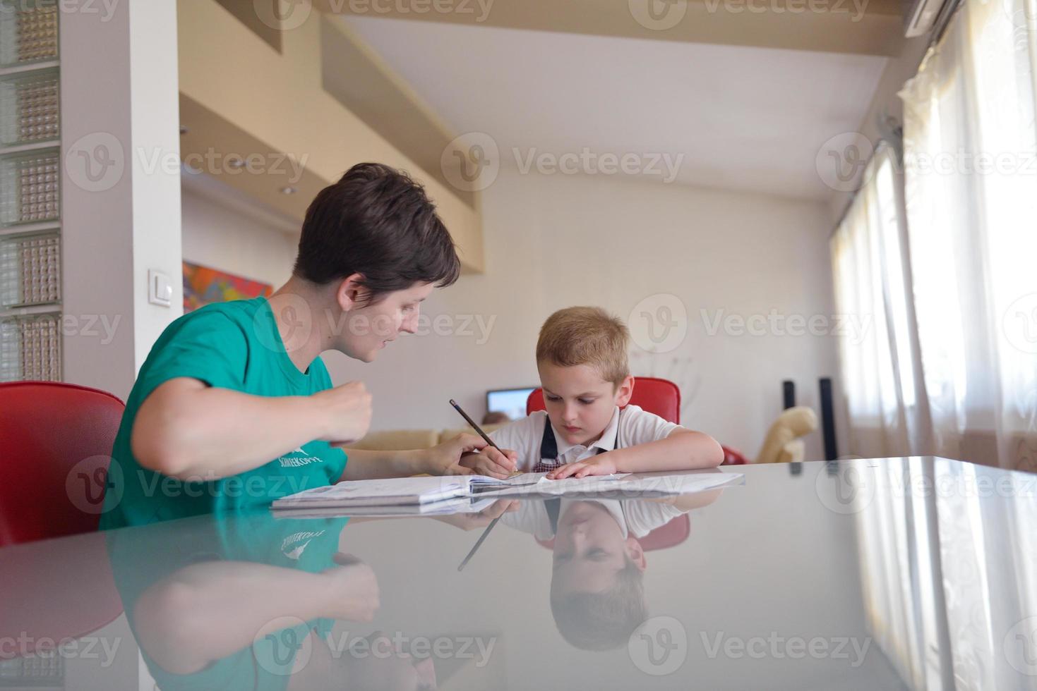 Boy doing homework photo