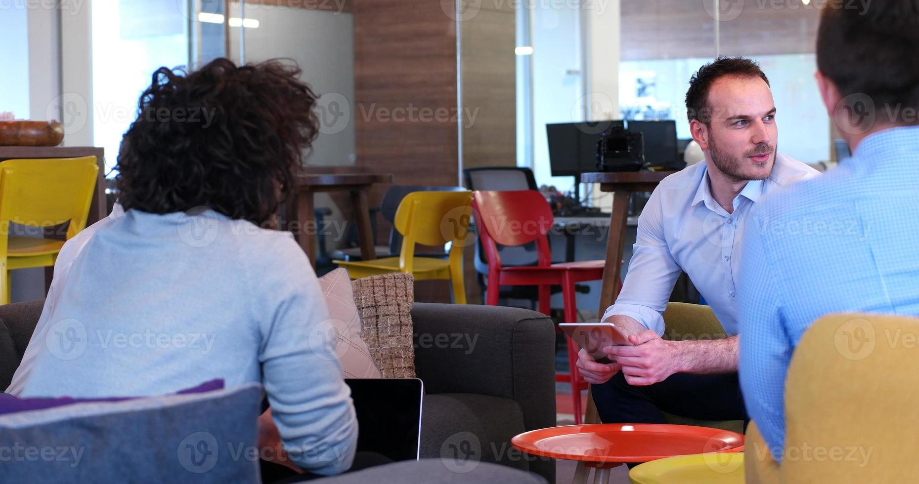 Startup Business Team At A Meeting at modern office building photo