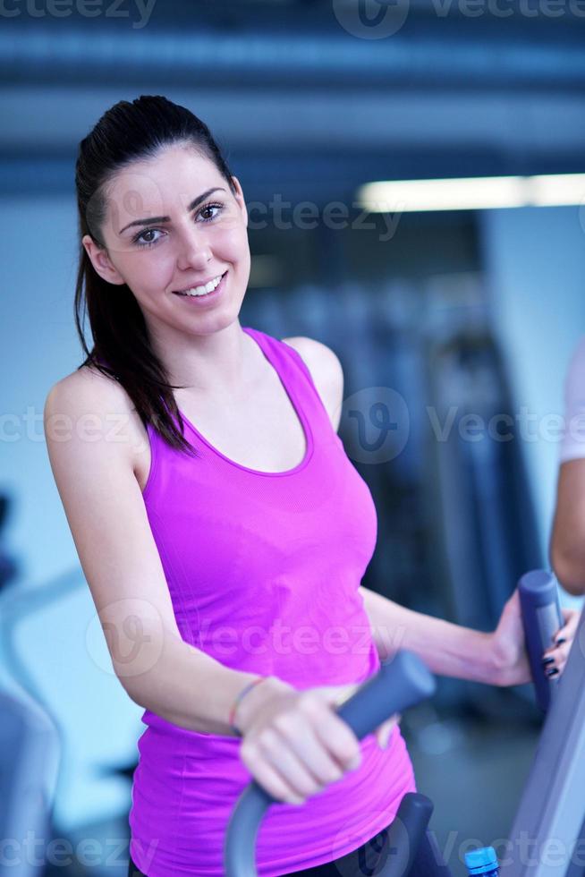 woman exercising on treadmill in gym photo
