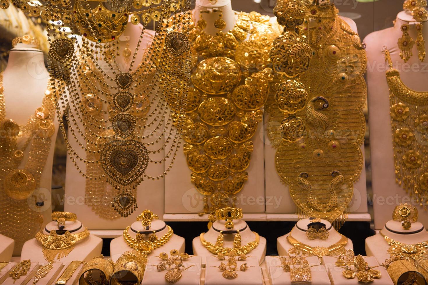 gold jewelry in the shop window photo