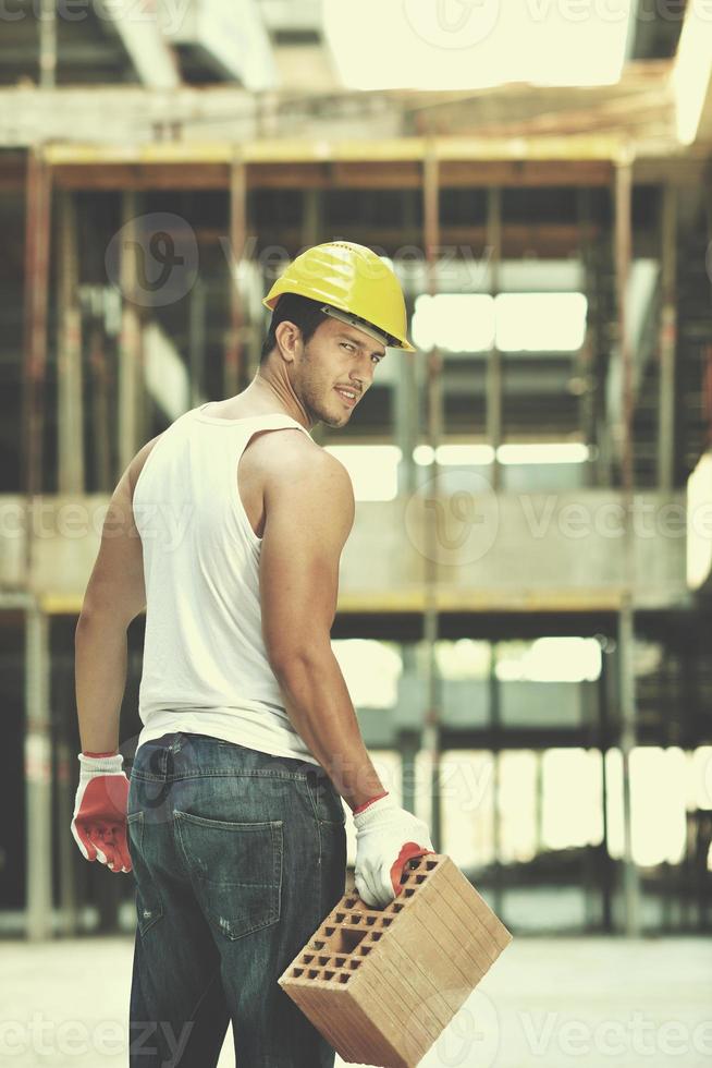 hard worker on construction site photo