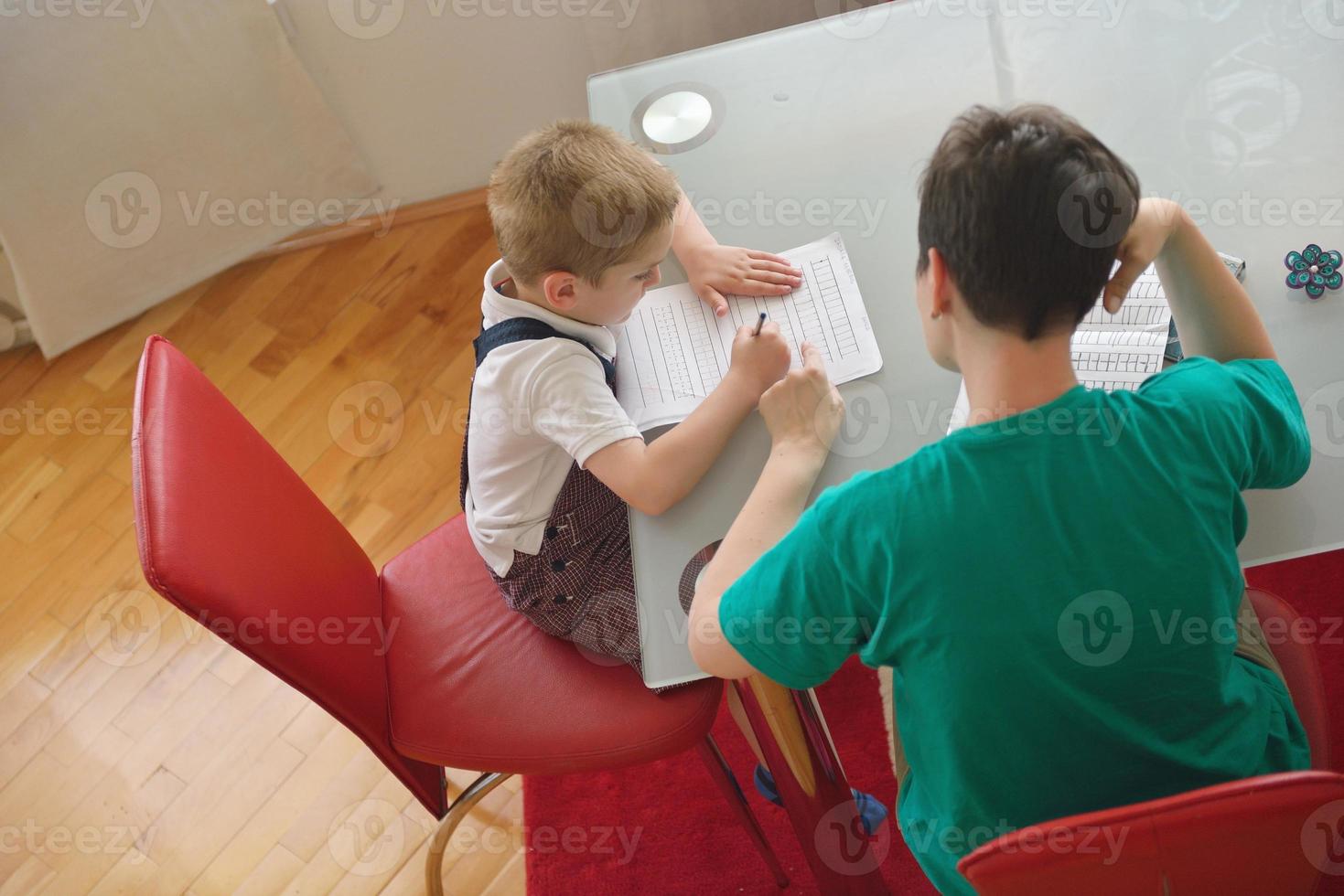 Boy doing homework photo