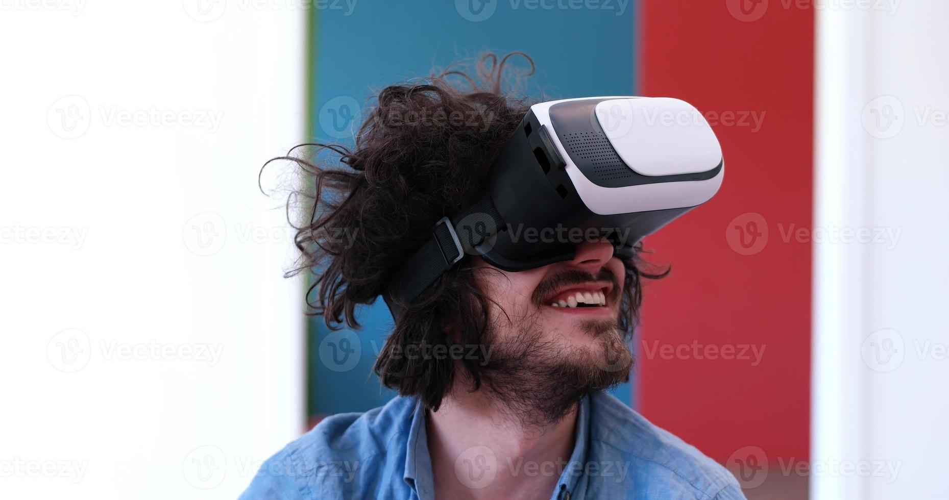 man using VR-headset glasses of virtual reality photo
