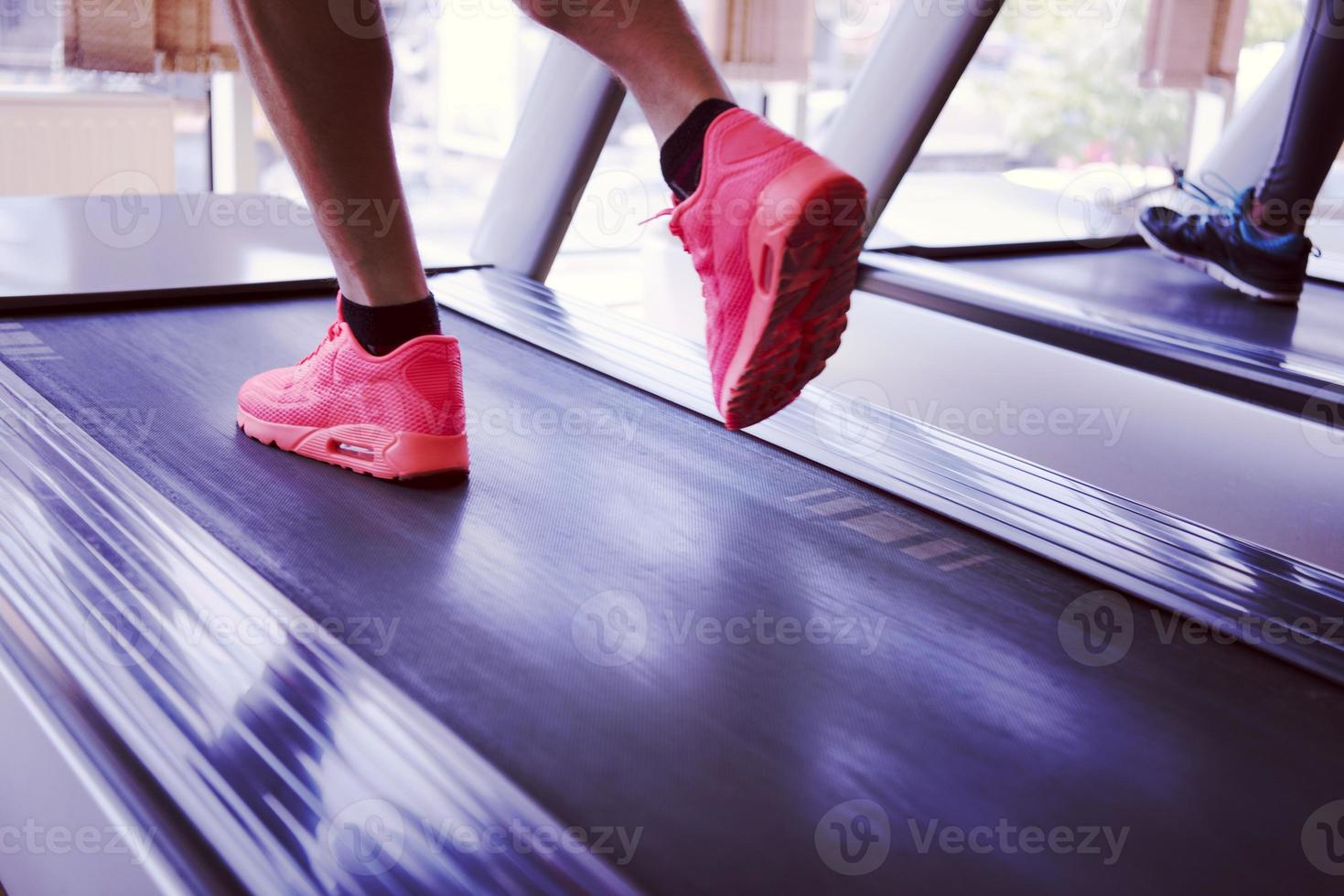 sportsman exercise jogging on treadmill photo